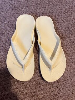 Archies Lemon flip flops. Worn once so bottom has marks but no wear.